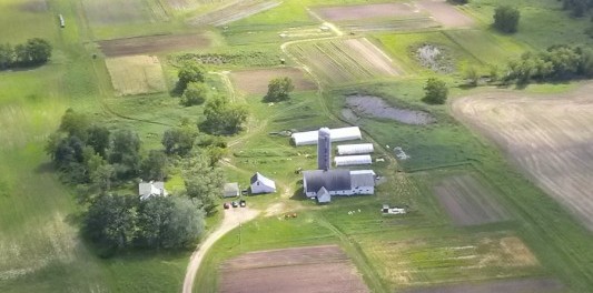 0706141528e-e1452051973736 Aerial Farm View