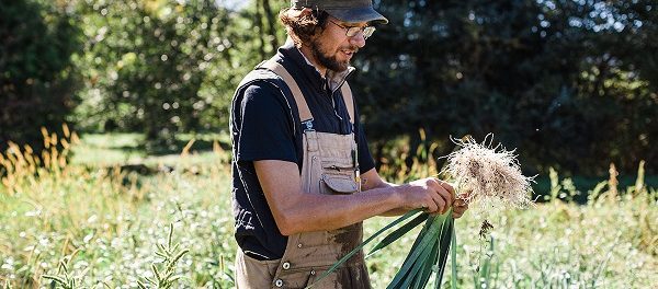 Jake with leeks farm production crew